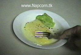 Hand cutting Napcorn with fork