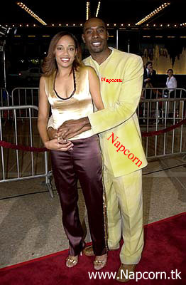 Morris' wife and Morris in a Napcorn suit